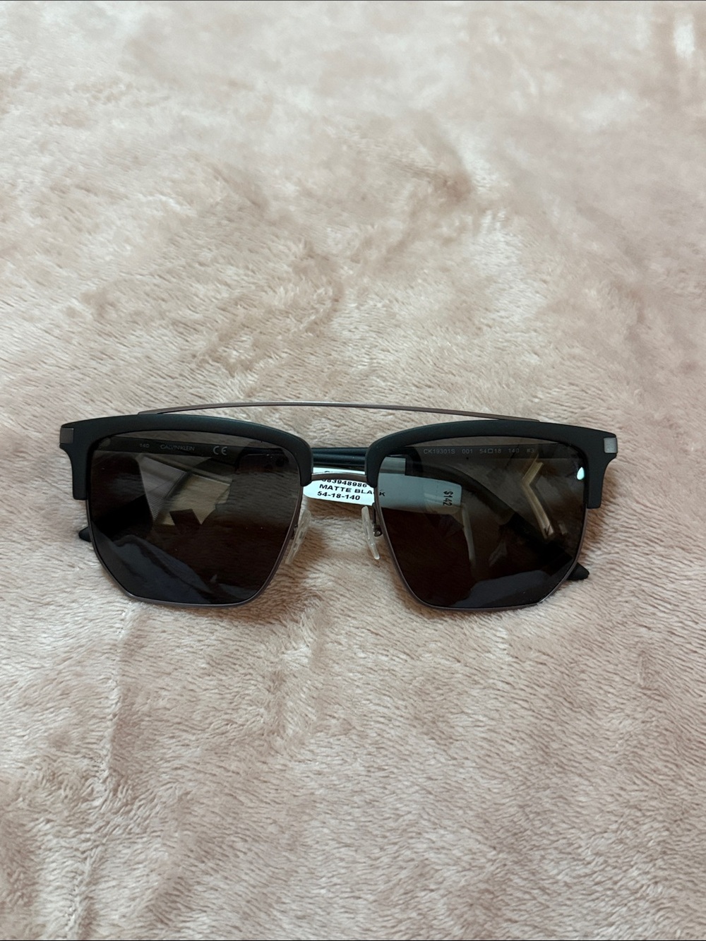 Calvin Klein Black Square Sunglasses with Silver Trim